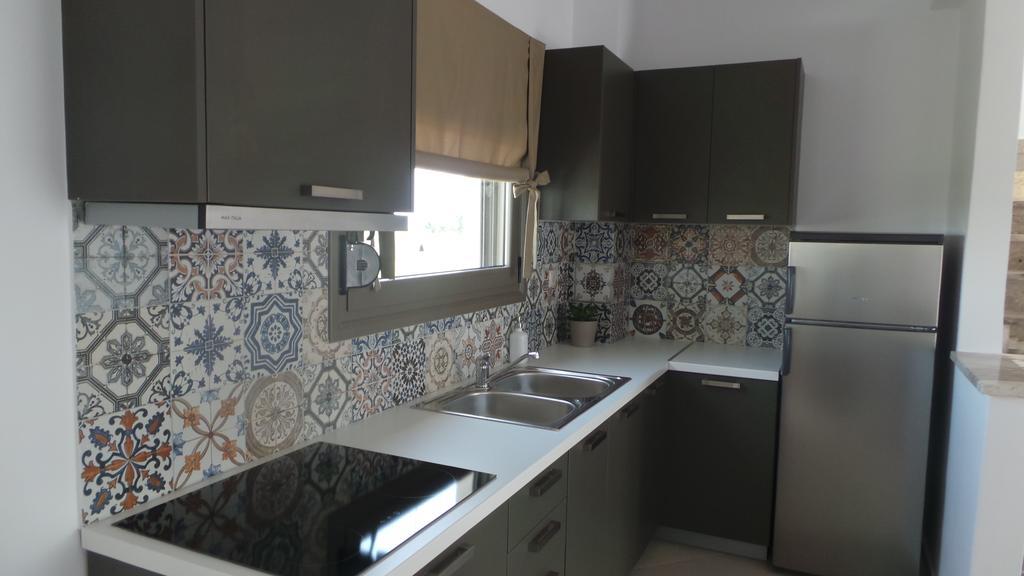 Niovi Boutique Apartments อาฟิโตส ห้อง รูปภาพ